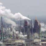 do carbon taxes work Exxon Mobil oil refinery Baton Rouge Louisiana