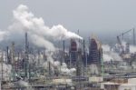 do carbon taxes work Exxon Mobil oil refinery Baton Rouge Louisiana